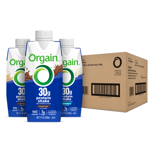 Orgain protein shake cartons with a cardboard box in the background