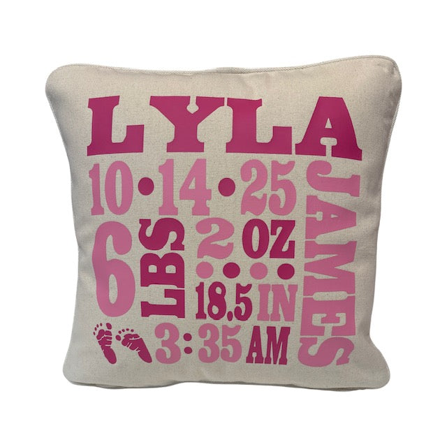 Birth announcement pillow — shown with custom embroidered details