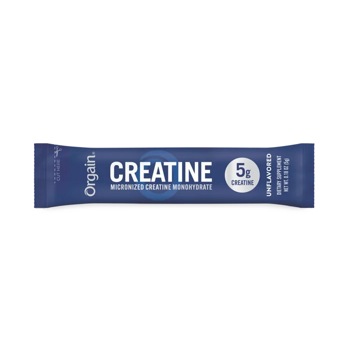 A single Orgain Creatine powder stick pack in dark blue packaging with white text.