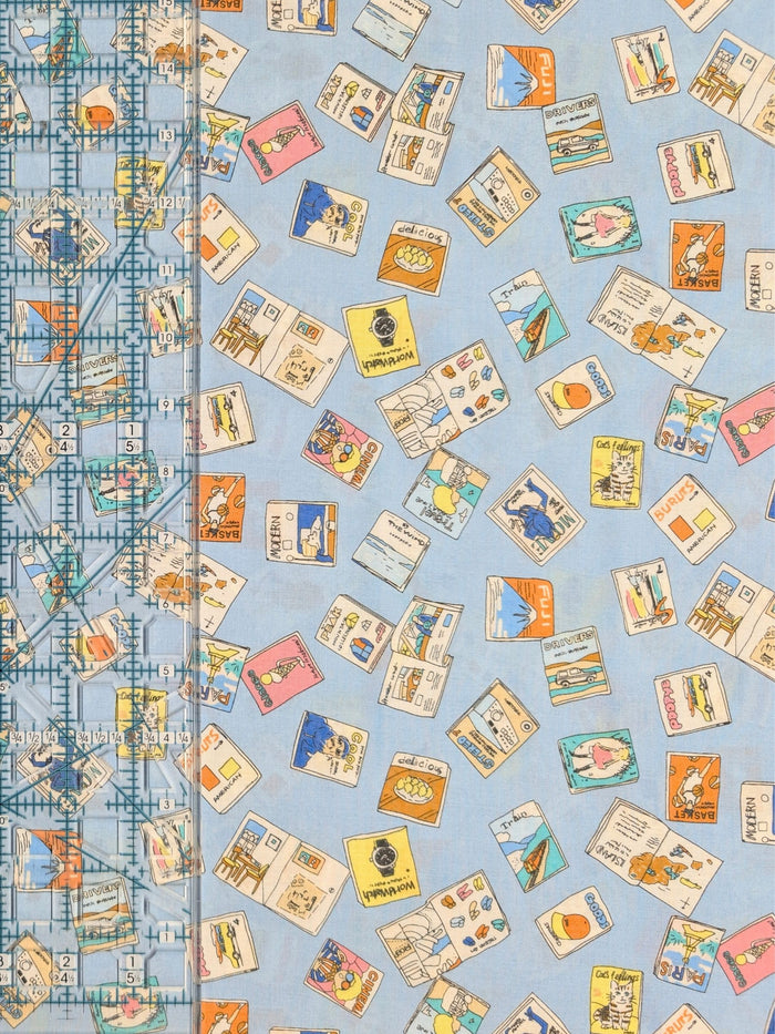 Hokkoh - Retro Magazines Cotton Lawn Fabric - Light Blue