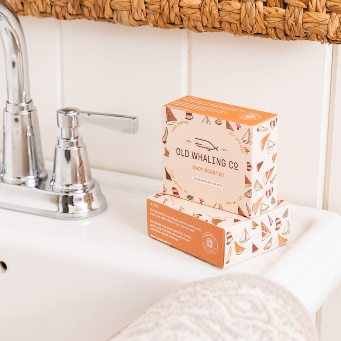 2 Knot Scented Bar Soap styled beside sink