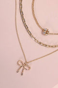 MULTI LAYER PEARL BOW CAHRM NECKLACE