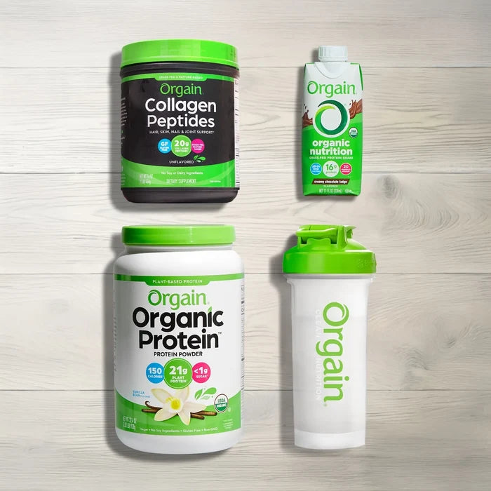 Orgain protein products including collagen peptides, organic protein powder, and a shaker bottle on a wooden surface.
