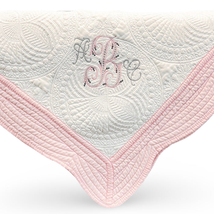 Personalized baby quilt — embroidered name included, heirloom baby shower gift