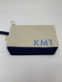 Personalized canvas makeup case — shown with school colors