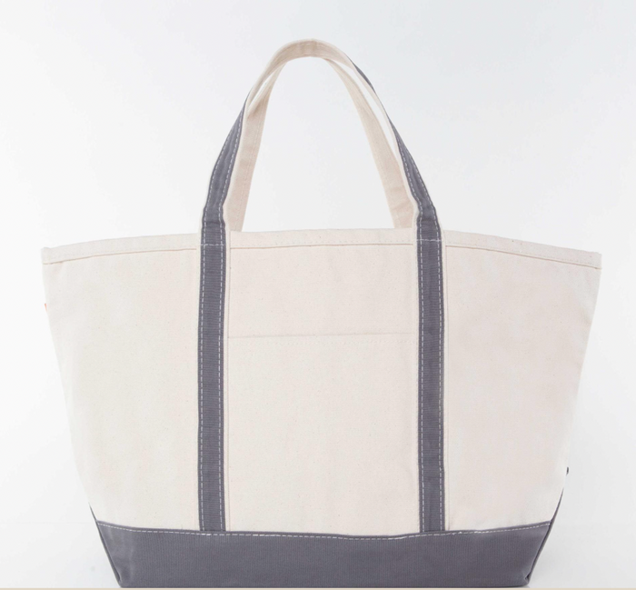 Personalized medium boat bag — shown open with contents