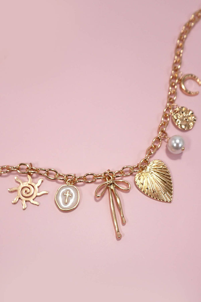 SUN BOW PEARL CROSS DISC  CHARM NECKLACE