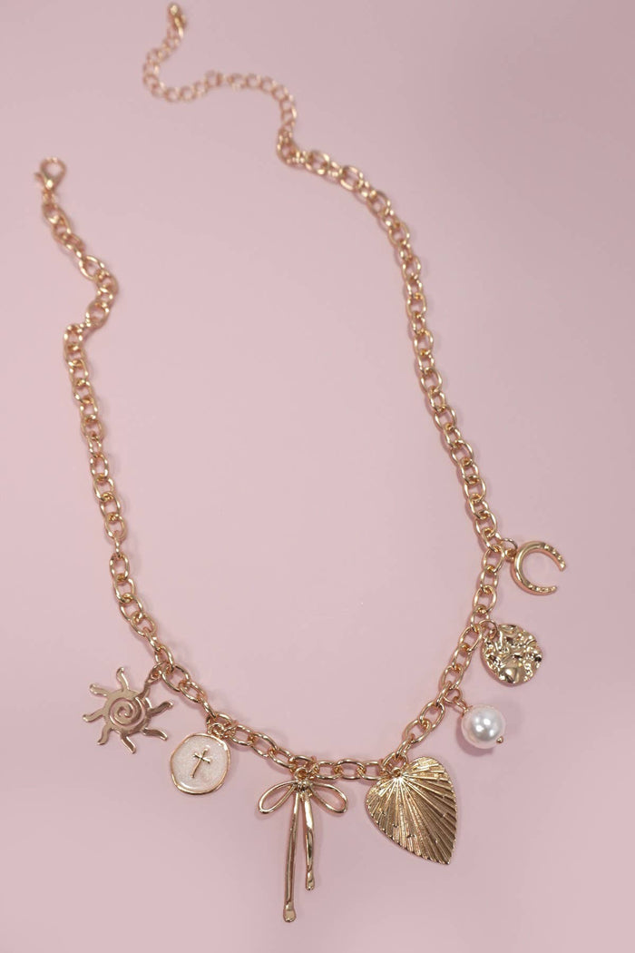 SUN BOW PEARL CROSS DISC  CHARM NECKLACE