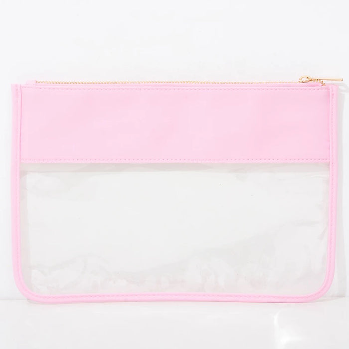 The Allie clear pouch — shown open with contents