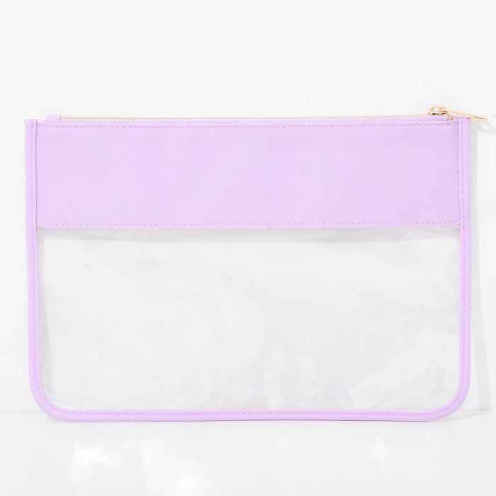 The Allie clear pouch — shown with essentials inside