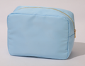 The Gianna nylon makeup bag — lifestyle shot shown in use