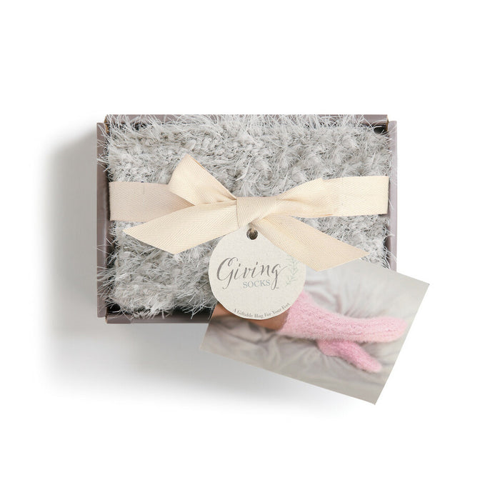 The Giving Socks — shown in packaging