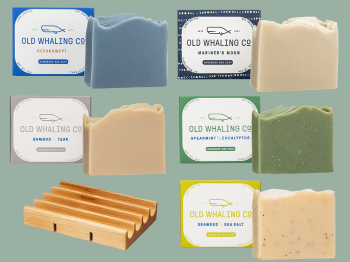 A set of 5 soaps on a light green background