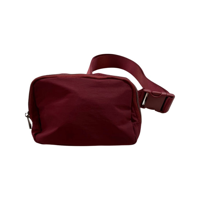 The Keely belt bag — shown being worn around waist